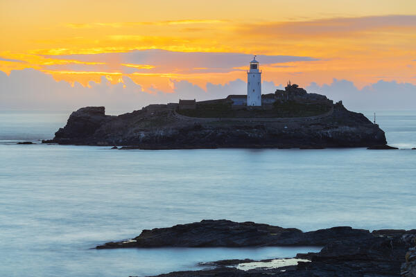 Godrevy lighthouse at sunset, Godrevy island, Cornwall, United Kingdom, Northern Europe