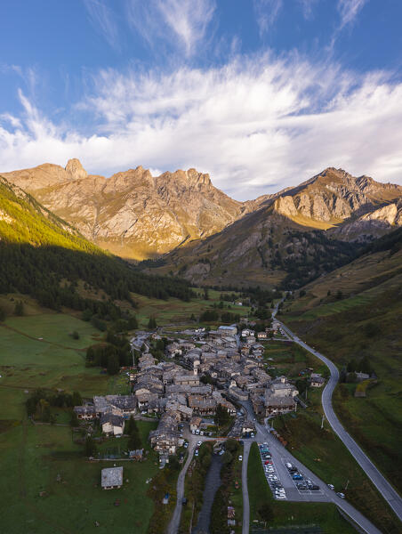 Aerial view of Pontechianale at sunrise during summer, Alpi del Monviso, Cuneo, Piedmont, Italy, Southern Europe 