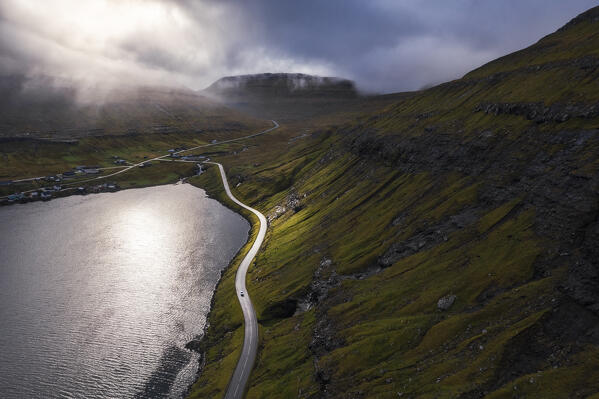 Aerial view of a car along the road of Funningsfjordur, Eysturoy, Runavik municipality, Faroe Islands, Denmark, Scandinavia
