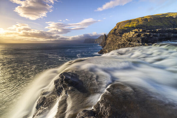 Bosdalafossur waterfall at sunset, Sorvagsvatn, Vagar, Faroe Islands, Denmark, Scandinavia