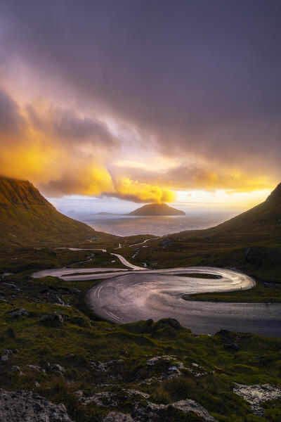 View of Koltur island with a bendings road in the foreground, Streymoy, Torshavn municipality, Faroe Islands, Denmark, Scandinavia