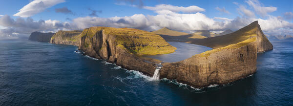 Aerial and panoramic view of Bosdalafossur waterfall and Sorvagsvatn, Sorvagsvatn, Vagar, Faroe Islands, Denmark, Scandinavia