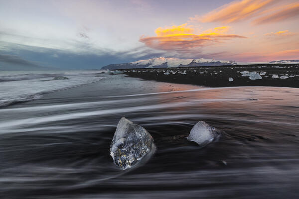 Blocks of ice at Diamon beach during sunrise, Jökulsárlón, Diamond beach, Austurland, Iceland, Northern Europe
