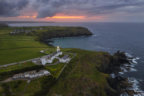 Aerial view of Lizard Point Lighthouse at sunrise, Lizard Point, Cornwall, United Kingdom, Northern Europe