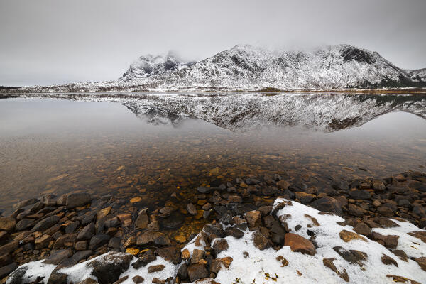 Reflections at Opsvatnet near Svolvaer in a moody day, Vagan, Nordland, Lofoten, Norway, Northern Europe