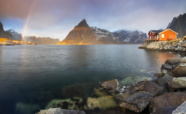 Panoramic view of a rainbow at Sakrisoy and Olstind, Moskenes, Moskenesoya, Nordland, Lofoten, Norway, Northern Europe
