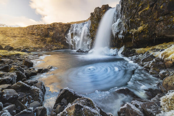 Frozen Kirkjufellsfoss, Grundafjordur, Snaefellsnes peninsula, Vesturland region, Iceland, Northern Europe
