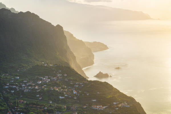 Elevated view from Miradouro da Beira da Quinta
over Arco de Sao Jorge at sunset, Santana, Madeira island, Portugal, Europe