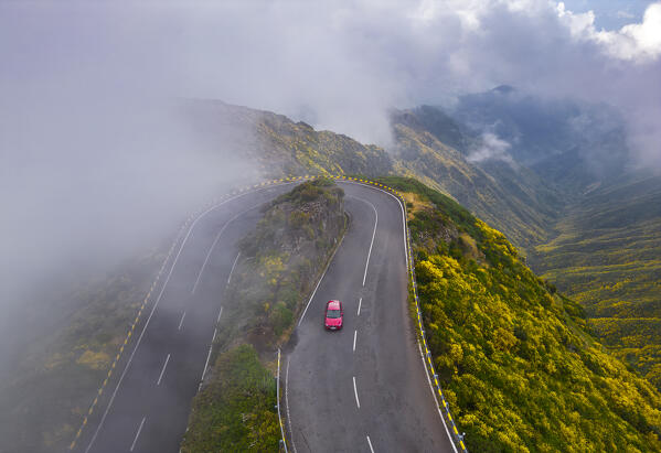 Aerial view of a car along the road of Lombo do Mouro, Serra de Agua, Madeira, Portugal, Europe