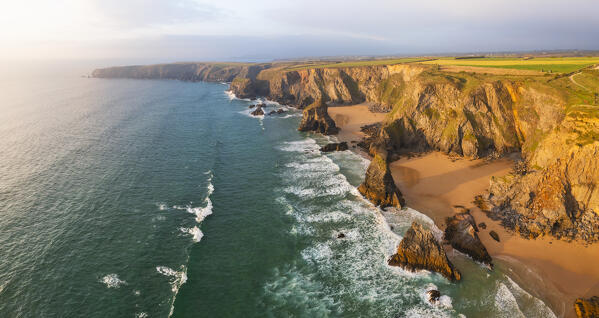Aerial view at Sunset at Carnewas and Bedruthan Steps, Bedruthan Steps, Newquay, Cornwall, United Kingdom, Northern Europe