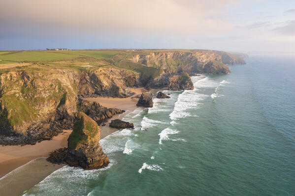 Aerial view at Sunset at Carnewas and Bedruthan Steps, Bedruthan Steps, Newquay, Cornwall, United Kingdom, Northern Europe