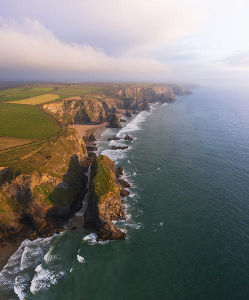 Aerial view at Sunset at Carnewas and Bedruthan Steps, Bedruthan Steps, Newquay, Cornwall, United Kingdom, Northern Europe