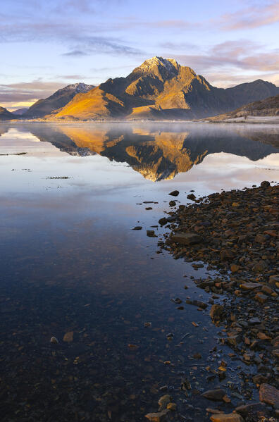 Mountains and reflections during sunset, Leknes, Vestvagoy, Nordland, Lofoten Islands, Norway, Northern Europe