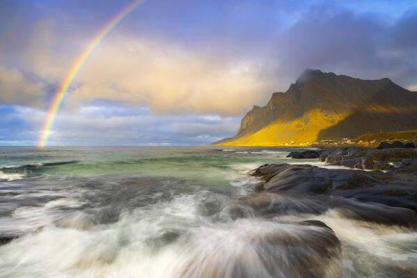 Rainbow at Vikten beach during sunset, Flakstad, Moskenesoya, Nordland, Lofoten Islands, Norway, Northern Europe