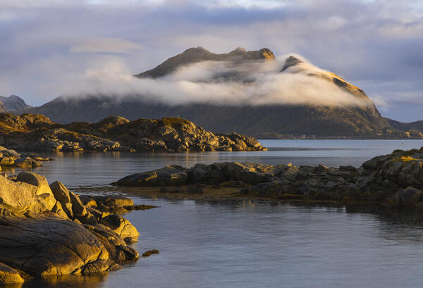 Mountains seen from Ballstad harbour during sunrise, Vestvagoy, Nordland, Lofoten Islands, Norway, Northern Europe