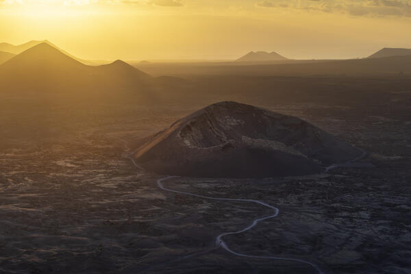 Volcan El Cuervo at sunset seen from Montana Negra, Tinajo, Las Palmas, Lanzarote, Canary Islands, Macaronesia, Spain, Western Europe
