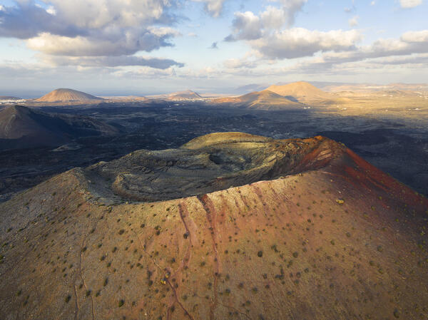 Aerial view of the crater of Caldera Colorada at sunset, Tinajo, Las Palmas, Canary Islands, Macaronesia, Spain, Western Europe