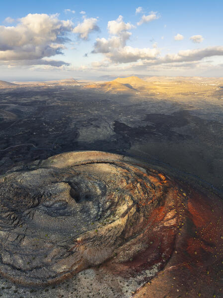 Aerial view of the crater of Caldera Colorada at sunset, Tinajo, Las Palmas, Lanzarote, Canary Islands, Macaronesia, Spain, Western Europe