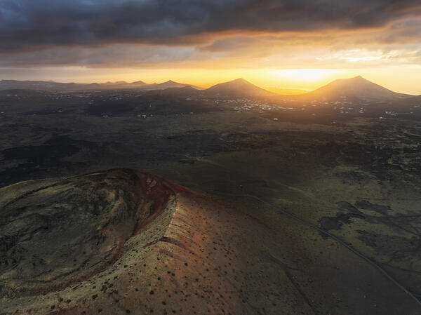 Aerial view of the crater of Caldera Colorada at sunrise, Tinajo, Las Palmas, Canary Islands, Macaronesia, Spain, Western Europe