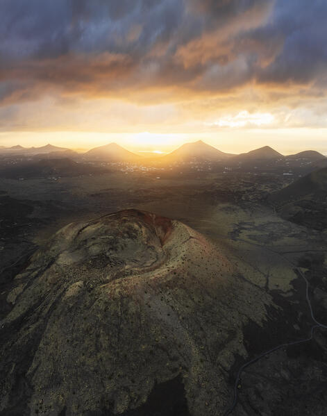 Aerial view of the crater of Caldera Colorada at sunrise, Tinajo, Las Palmas, Canary Islands, Macaronesia, Spain, Western Europe