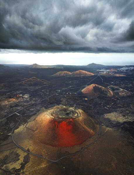 Aerial view of the crater of Caldera Colorada and lava fields, Tinajo, Las Palmas, Lanzarote, Canary Islands, Macaronesia, Spain, Western Europe