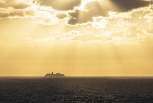 Seagulls at Longships Land’s End Lighthouse at sunset, Penwith peninsula, Cornwall, England, Great Britain, United Kingdom