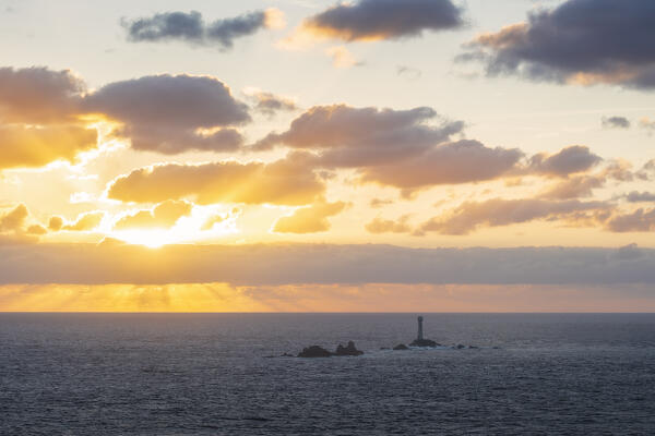 Longships Land’s End Lighthouse at sunset, Penwith peninsula, Cornwall, England, Great Britain, United Kingdom