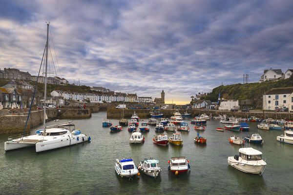 Porthleven harbour and boats during sunrise, Cornwall, England, Great Britain, United Kingdom