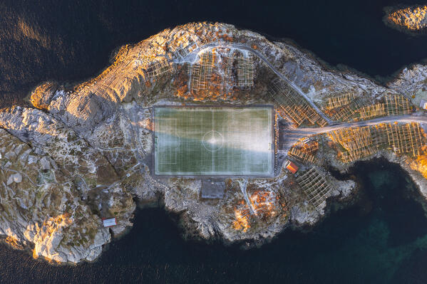 Aerial view during Sunset over Henningsvaer football field, Vågan, Austvågøy, Nordland, Lofoten, Norway, Northern Europe