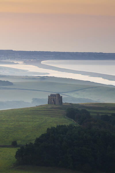 St Catherine’s Chapel and Chesil Beach viewed from hills around Abbotsbury, Dorset, United Kingdom, Northern Europe 