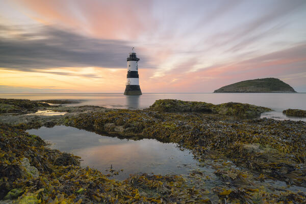 Trwyn Du Lighthouse at sunset, Llangoed, Gwynedd, Anglesey, Wales, Great Britain, United Kingdom