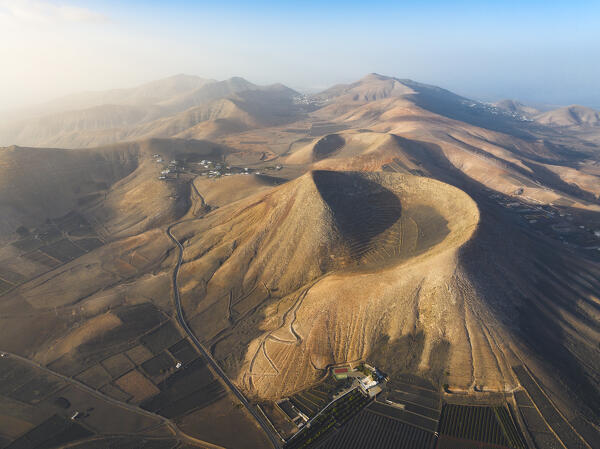 Aerial view of Caldera Riscada at sunrise, La Geria, Las Palmas, Lanzarote, Canary Islands, Macaronesia, Spain, Western Europe