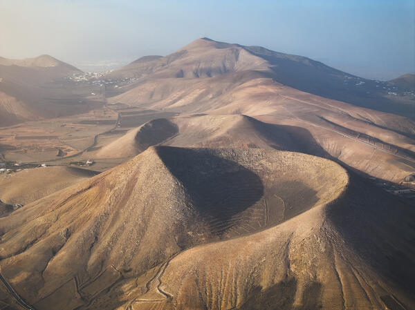 Aerial view of Caldera Riscada at sunrise, La Geria, Las Palmas, Lanzarote, Canary Islands, Macaronesia, Spain, Western Europe