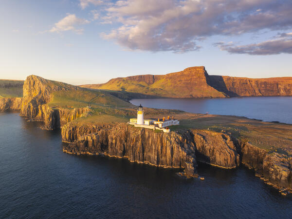 Aerial view during sunset at Neist Point lighthouse, Isle of Skye, Inner Hebrides, Highlands, Scotland, United Kingdom