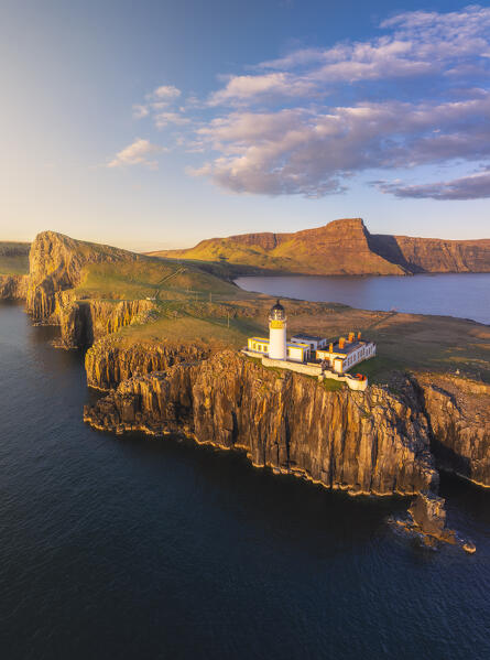 Aerial view during sunset at Neist Point lighthouse, Isle of Skye, Inner Hebrides, Highlands, Scotland, United Kingdom