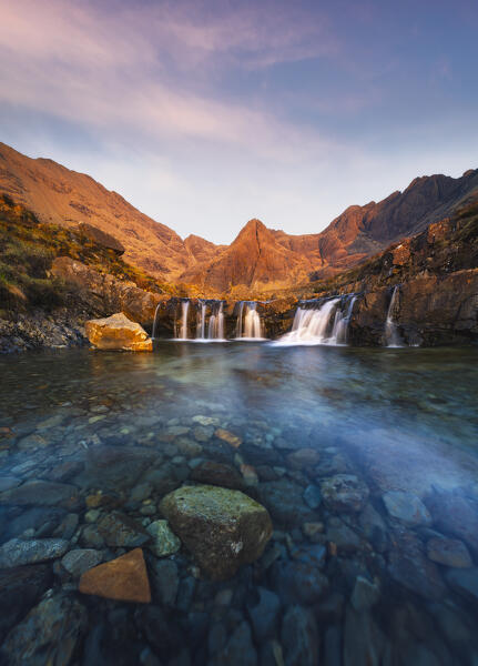 Fairy Pools and Sgurr an Fheadain during sunset, Isle of Skye, Inner Hebrides, Highlands, Scotland, United Kingdom