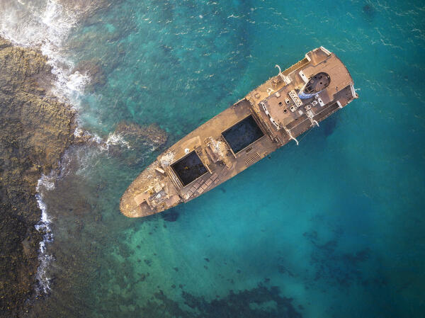 Aerial view of shipwreck near Arrecife at sunrise, Las Caletas, Las Palmas, Lanzarote, Canary Islands, Macaronesia, Spain, Western Europe
