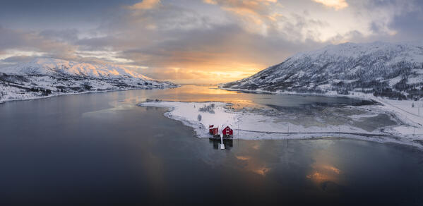 erial and panoramic view of house mountains and fjord at Austre Kanstad during winter sunset, Lodingen, Nordland, Lofoten Islands, Norway, Northern Europe