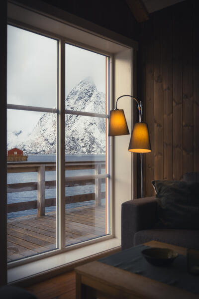 Interior of a Rorbu in Hamnoy with the view of Olstinden in the background, Hamnoy, Moskenes, Moskenesoya, Nordland, Lofoten, Norway, Northern Europe