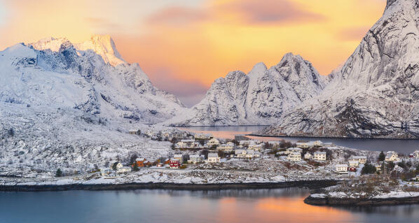 Elevated view of houses around Sakrisoy and Hamnoy at sunrise with mountains in the background, Hamnoy, Moskenes, Moskenesoya, Nordland, Lofoten, Norway, Northern Europe