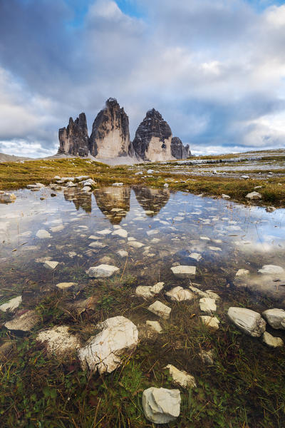 Tre Cime di Lavaredo in a reflection, Dobbiaco, Bolzano, Trentino Alto Adige, Italy, Western Europe