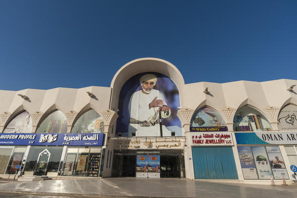 The portrait of Sultan Qaboos on the entrance of a shopping center in Muscat, Oman.