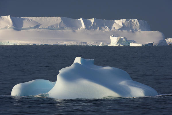 An iceberg floats in the Lemaire channel, Antarctica.