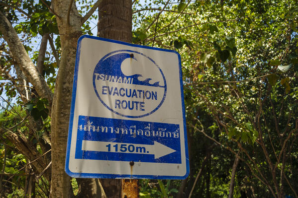 A tsunami evacuation route sign, Ko Kradan, Talay Trang archipelago, Thailand.