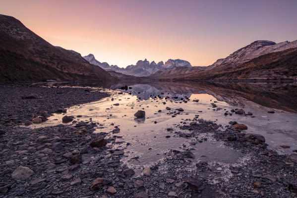 Southern America, Chile, Patagonia, Torres del Paine National Park: the Torres at sunset from a remote spot on the road