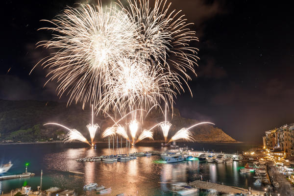 Fireworks on the town of Portovenere, municipality of Portovenere, La Spezia province, Liguria, Italy, Europe