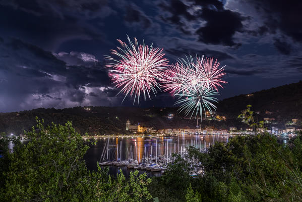 Fireworks and lightning on the town of Le Grazie, municipality of Portovenere, La Spezia province, Liguria, Italy, Europe