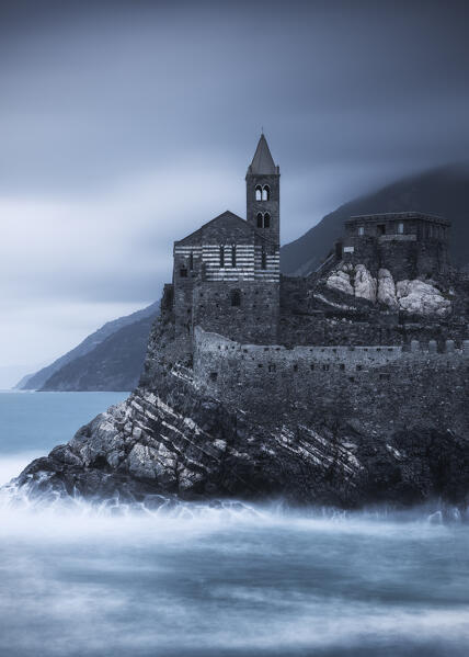 Long exposure on the church of San Pietro taken from the Palmaria island on a cloudy evening, municipality of Portovenere, La Spezia province, Liguria, Italy, Europe