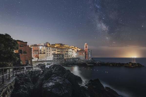 Milky way over the village of Tellaro, municipality of Lerici, La Spezia province, Liguria district, Italy, Europe
