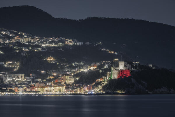 Photo with telephoto lens at night on the villages of Lerici and La Serra, castle of Lerici, municipality of Lerici, La Spezia province, Liguria district, Italy, Europe
